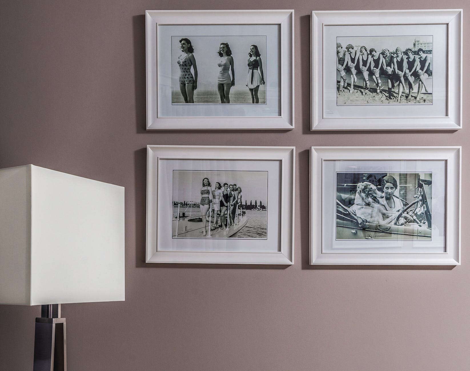 collection of framed photos on wall